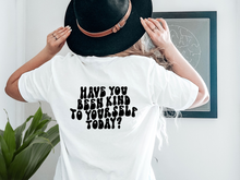 Load image into Gallery viewer, "Have you been kind to yourself today?" unisex t-shirt by Say Hello Threads, offering a hopeful and motivational message.