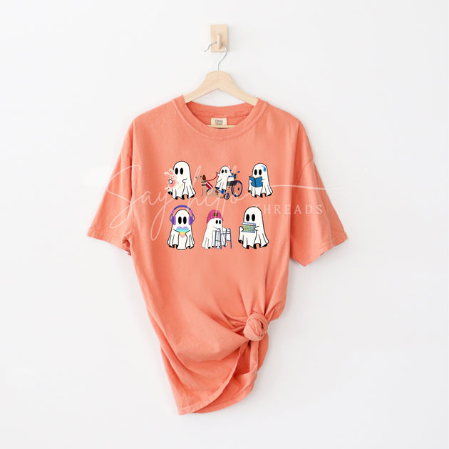 Inclusive Ghosts shirt by Say Hello Threads, featuring diverse ghost characters in a colorful print celebrating disability awareness and inclusion.
