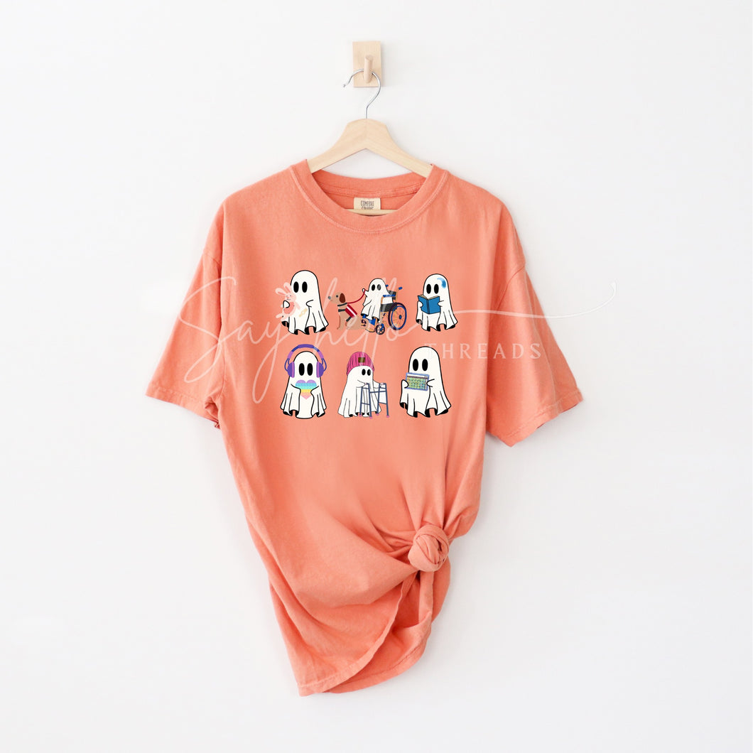 Inclusive Ghosts shirt by Say Hello Threads, featuring diverse ghost characters in a colorful print celebrating disability awareness and inclusion.
