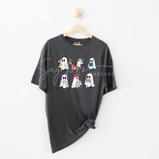 Inclusive Ghosts shirt by Say Hello Threads, featuring diverse ghost characters in a colorful print celebrating disability awareness and inclusion.

