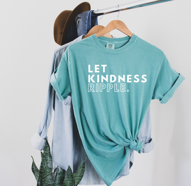 "Let Kindness Ripple" unisex Comfort Colors t-shirt by Say Hello Threads, promoting positivity and compassion.
