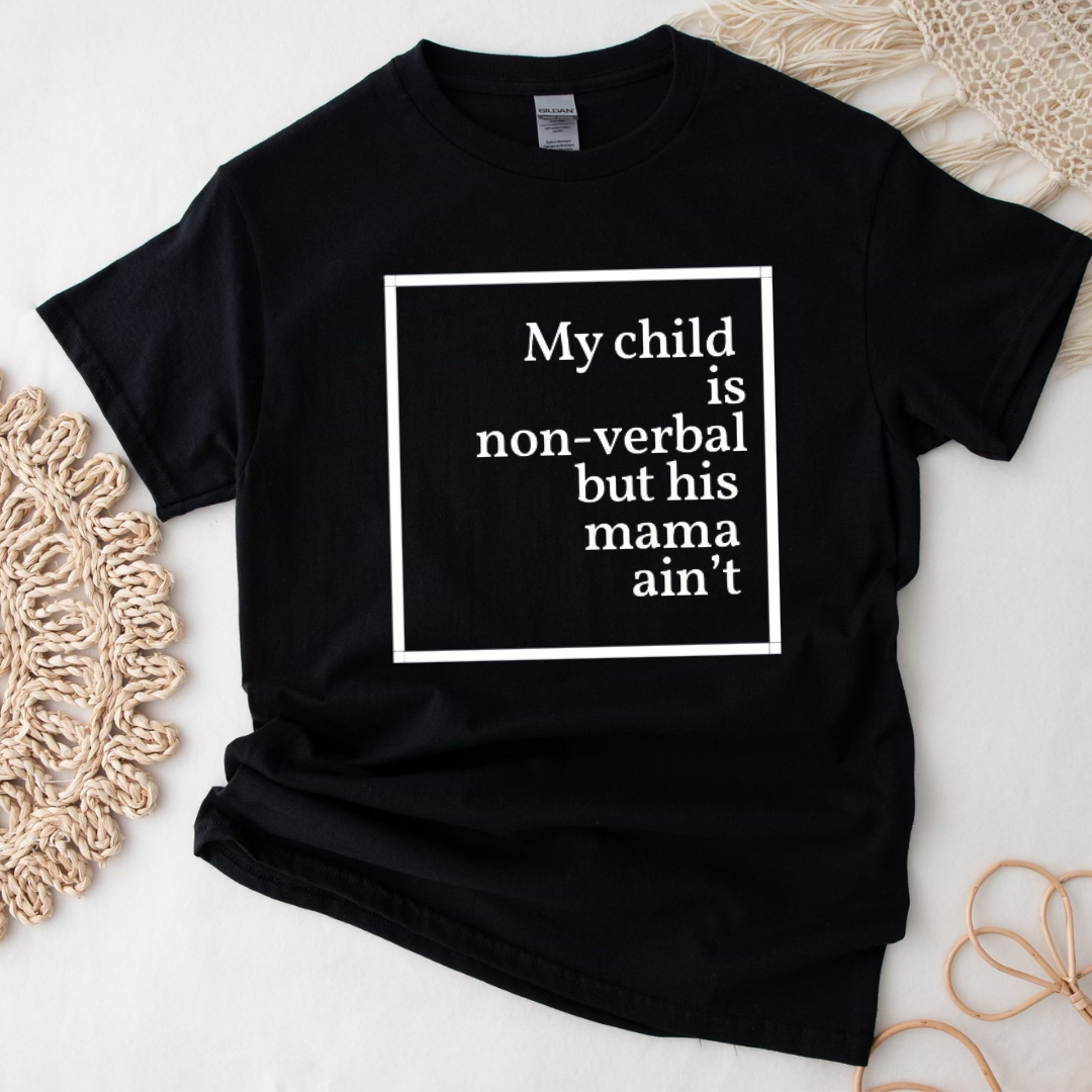 "My child is non-verbal, but his Mama Ain't" unisex short sleeve t-shirt by Say Hello Threads, featuring a bold white graphic design. 