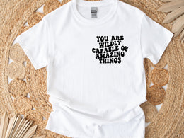 "Wildly Capable" unisex t-shirt by Say Hello Threads, inspiring confidence and empowerment.